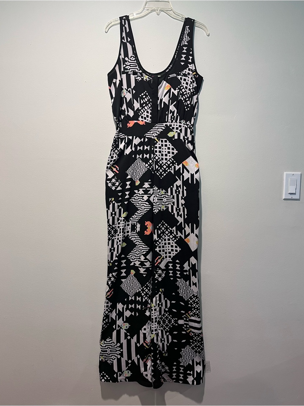 Sleeveless Bebe Geometric Jumpsuit with pockets